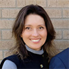 Katia Cristina Portero Sloan smiling in a headshot.